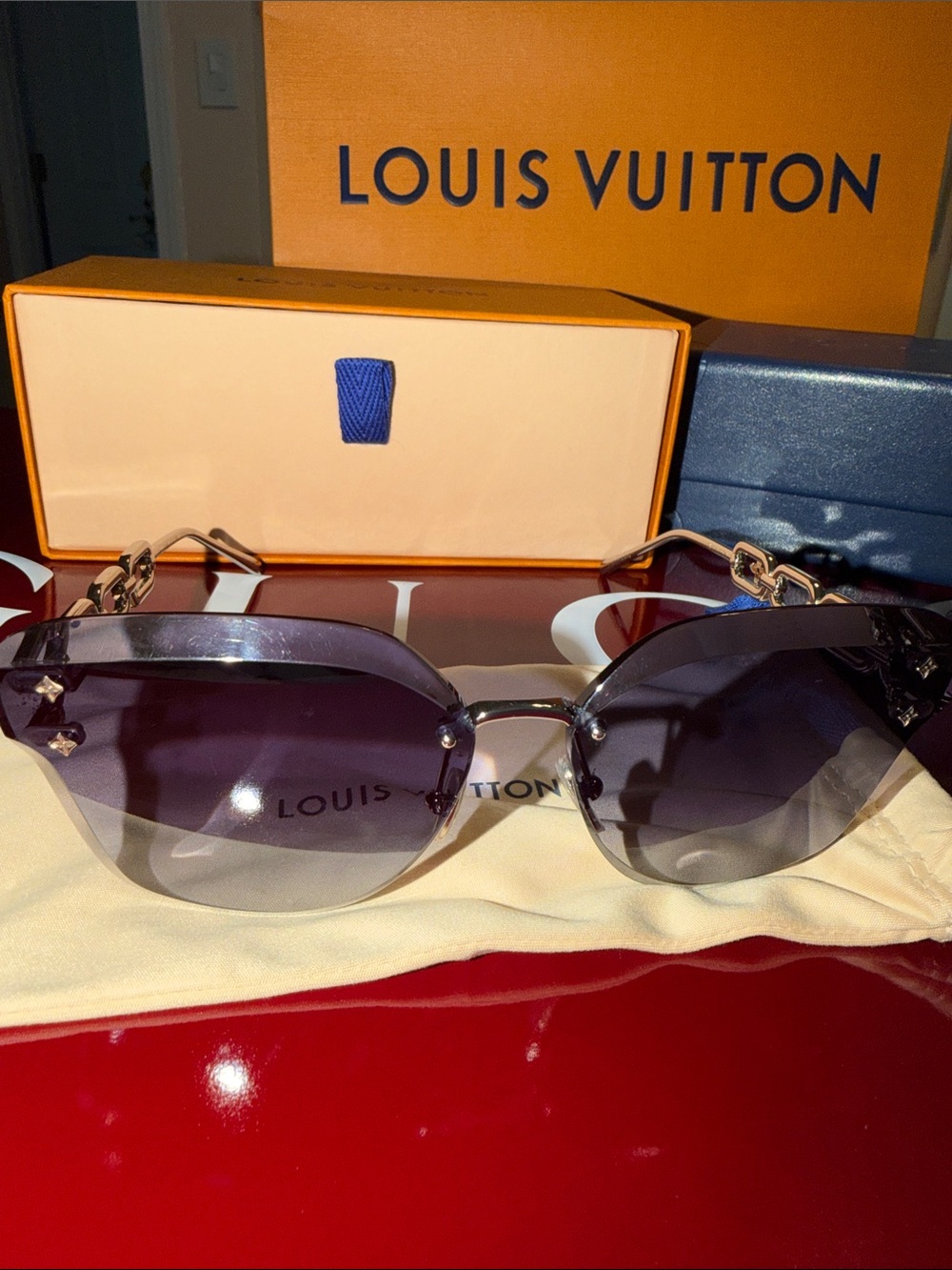 Louis Vuitton Women's Rimless Sunglasses with Purple Gradient Lenses